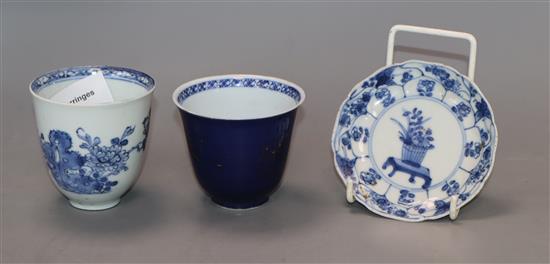 Two Chinese Kangxi blue and white cups and a similar saucer